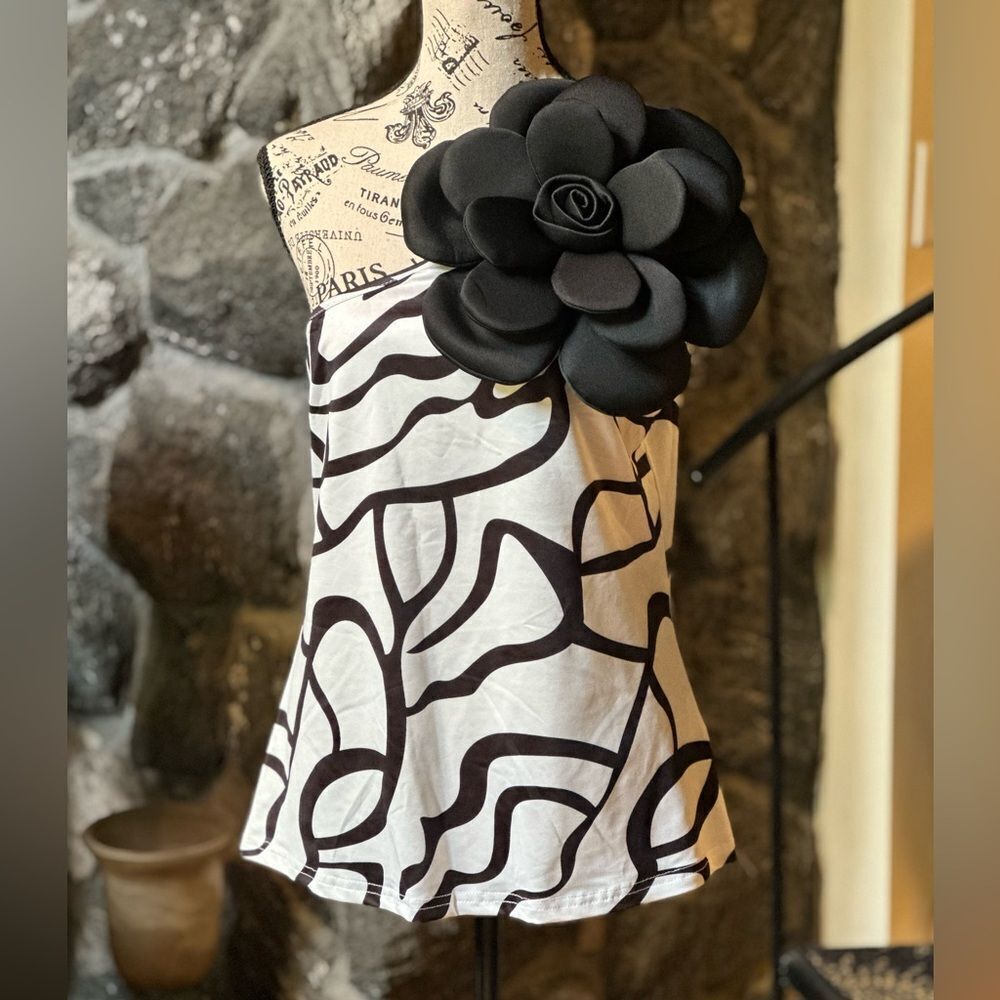 Chic Black and White Top with Floral Accent